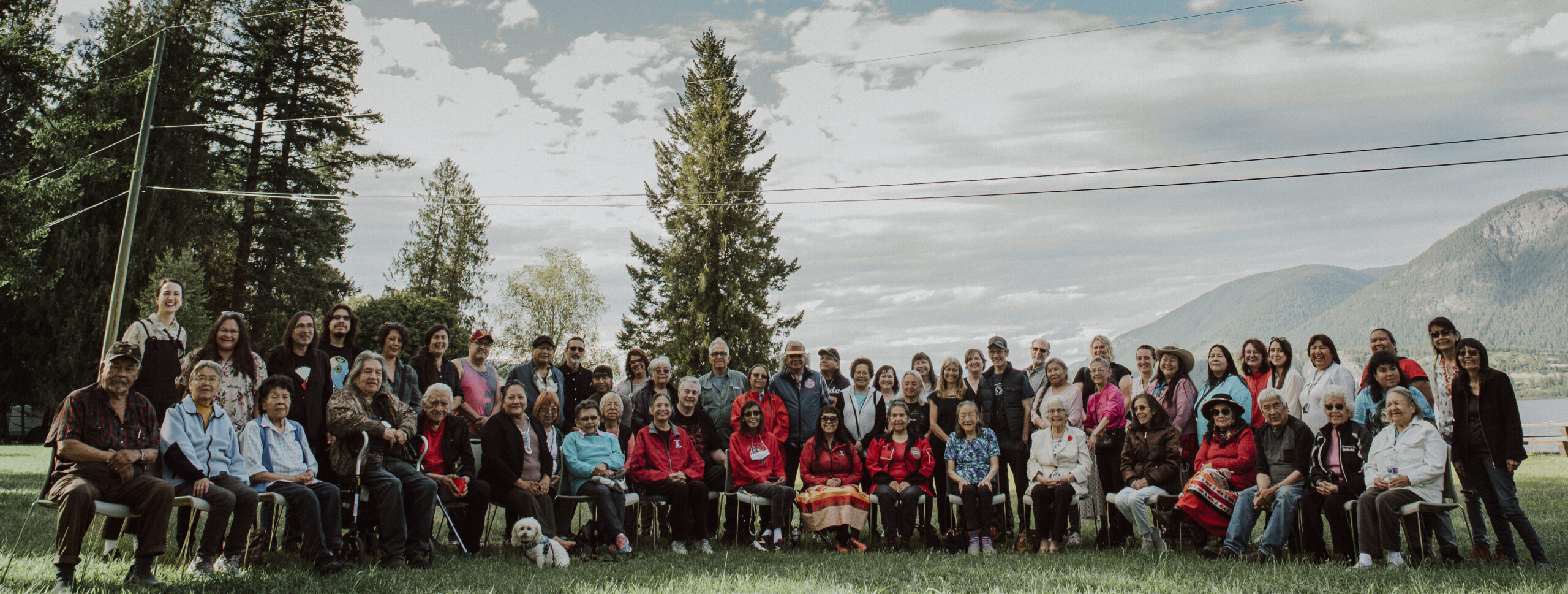 A group of people involved in the Secwépemc Landmarks Project stand in front of Sxwetsméllp landmark in Salmon Arm’s Wharf and Marine Peace Park.